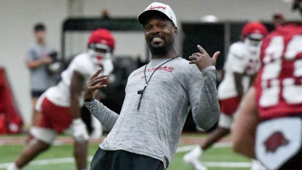 Razorbacks defensive backs coach Deron Wilson at practice Monday morning indoors